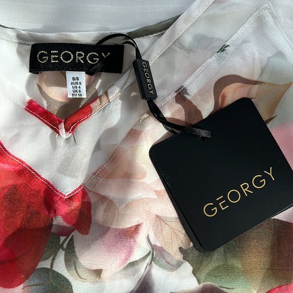NWT Georgy sheer white top with floral print. Size small. - Picture 3 of 4